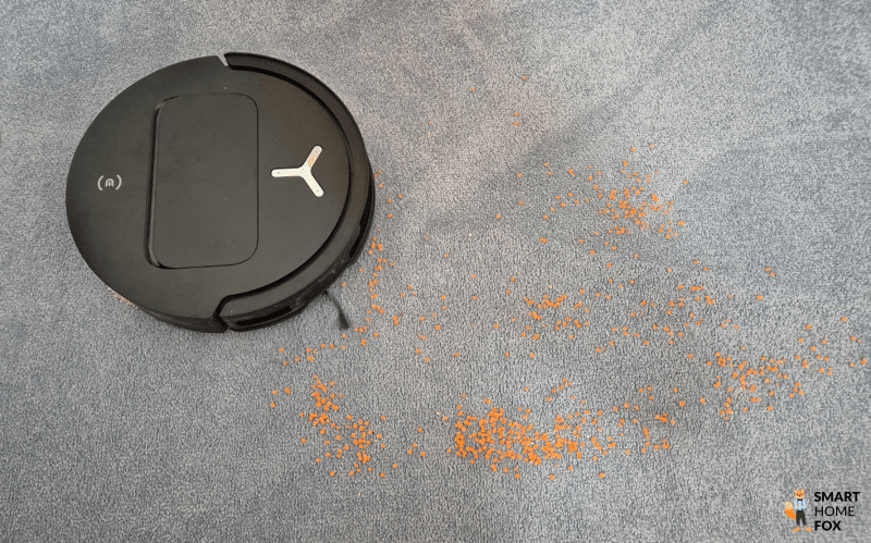 Das Saugtest-Ergebnis des ECOVACS DEEBOT T50 OMNI auf dem Teppichg ist zu sehen.